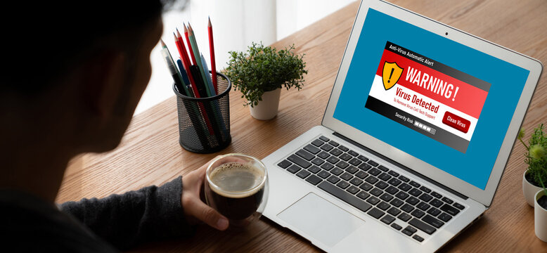 Virus warning alert on computer screen detected modish cyber threat , hacker, computer virus and malware - Powered by Adobe