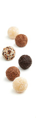 Typical Brazilian sweet brigadeiro. Assorted flavors of candies on a white background