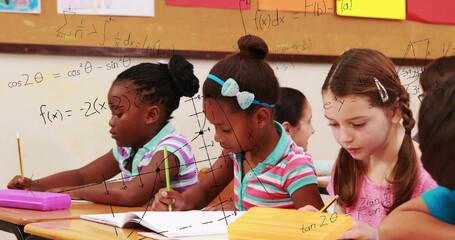 Writing three students wearing striped polos, blue bow and pink shirt with notebooks in classroom © vectorfusionart