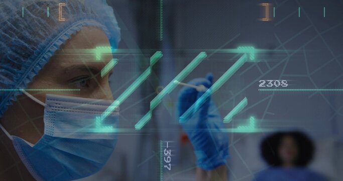 Touching nurse in surgical cap, mask and blue gloves at bed, using swab on holographic interface - Powered by Adobe