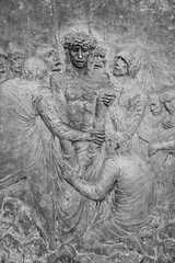 Station X: Jesus is stripped of his garments (Division of robes). The Way of the Cross on Mount Križevac (the Cross Mountain) in Medjugorje.