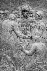 Station X: Jesus is stripped of his garments (Division of robes). The Way of the Cross on Mount Križevac (the Cross Mountain) in Medjugorje.