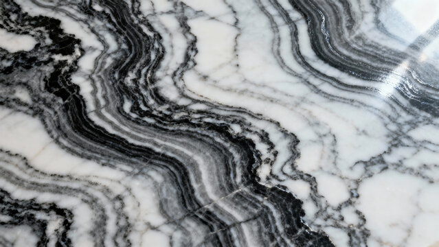 Close-up of black and white marble with swirling patterns