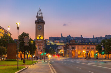 View of Torre dei Caduti and Bergamo skyline at dusk in Lombardy, Italy