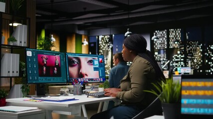 Professional woman uses editing software and AI chatbot on dual monitors setup, creative workspace. Using digital tools for high quality image processing and color enhancement. Camera A.