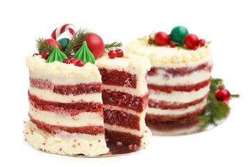 Delicious cakes with Christmas decor isolated on white