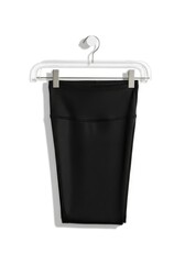 Black athletic shorts hang suspended on a clear plastic hanger with metal clips against a plain white background