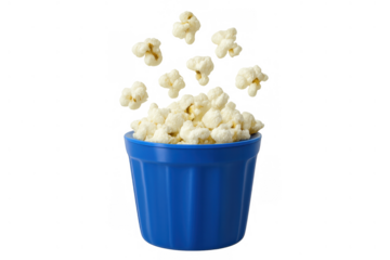 Popcorn flying and falling into a blue bowl, a popular snack for enjoying films, shows, and relaxing moments, on transparent background