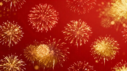 Golden fireworks exploding against a vibrant red background