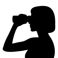 silhouette of a person using binoculars