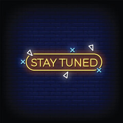 stay tuned neon signboard with brick wall background vector