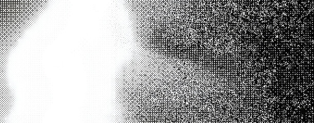 Abstract black and white halftone texture with gradient effect