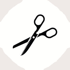 Black silhouette of pinking shears on a textured background