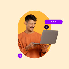 A young man with a mustache smiles as he holds a laptop, immersed in his work. The background...