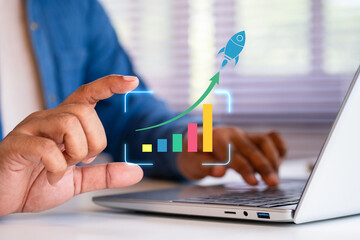 Business growth to target. Startup new project. Rocket launching from laptop to business icon. Represent strategic planning, Goal setting. Investment management. Company strategy. Business vision