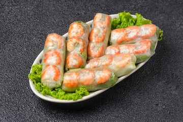 Gỏi cuốn, Vietnamese spring rolls, summer spring rolls, or salad spring rolls, a traditional dish in Vietnamese cuisine consisting of chicken, shrimp, vegetables, bún, and other ingredients wrapped in
