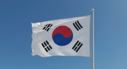 Waving South Korean flag against a clear blue sky expressing national pride and identity