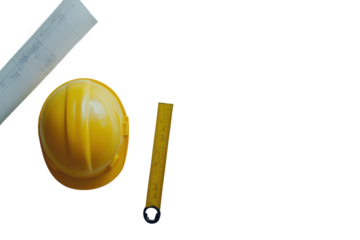 Overhead view of a yellow hard hat, rolled blueprint, and yellow measuring tape on white, representing construction and safety equipment isolated on transparent background
