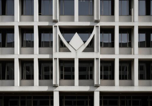 Modern architectural facade with geometric patterns and symmetrical windows