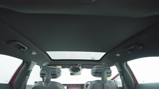 Sunroof of a car from inside. Modern car interiors.