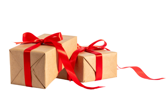 Two brown paper wrapped gifts tied with red ribbons, one slightly larger, stacked together isolated on white