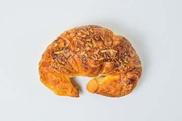Top view of cheese croissant isolated on white background. Clipping path. Fresh, brown. close up, high angle, above, flat lay. 