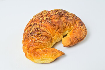 Close up view of cheese croissant isolated on white background. Clipping path. Fresh, brown. 