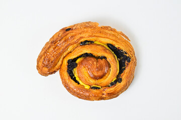 Top view of raisin roll isolated on white background. Clipping path. Fresh, brown. close up, high angle, above, flat lay.