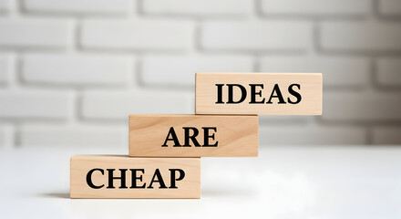 Discover the power of ideas that drive innovation and success, wooden blocks spell out the message in a modern and inspiring way