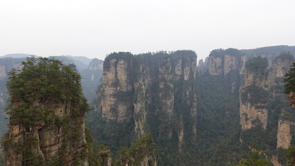 The unique landscape of the park, particularly the "Heavenly Pillar, Zhangjiajie National Forest Park, a UNESCO World Heritage site known for its unique and towering sandstone pillars