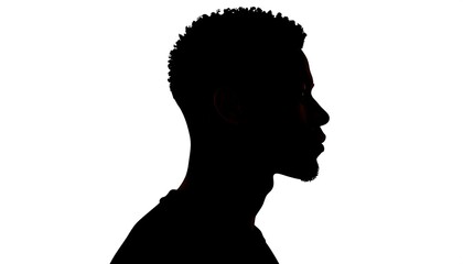 Silhouette of a Mans Profile Against White Background.