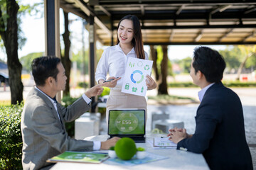 Business team discussing esg sustainability in outdoors meeting