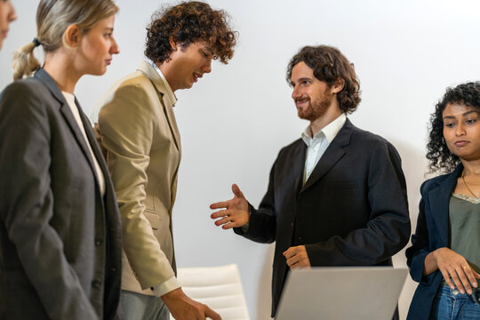 Diverse business team brainstorming together, strategic planning with tablet in office, inclusive workplace, financial strategy, b2b startup innovation, teamwork seminar and corporate collaboration - Powered by Adobe