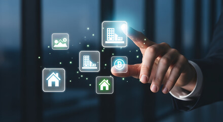 Digital Real Estate Management: Hand Touching Virtual Property Icons for Smart Investment and Urban Development Technology