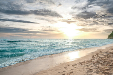 Peaceful Ocean Landscape at Golden Hour Tropical Seashore with Sunset Sky Calm Sea Waves on Sandy Beach