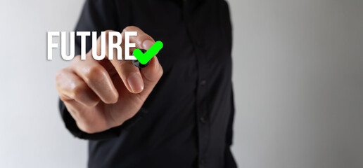 A person points a digital pen forward at the word 