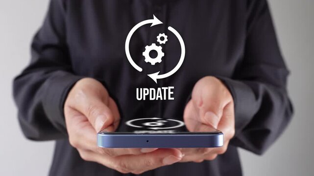 Female corporate leader showing her cell phone with an update animation