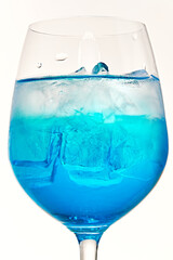 A refreshing blue curaçao cocktail in a glass