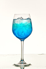 A refreshing blue curaçao cocktail in a glass