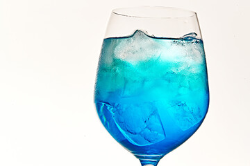 A refreshing blue curaçao cocktail in a glass