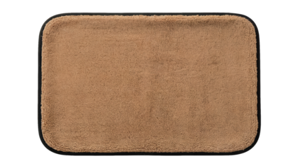 Soft and inviting caramel bath mat, perfect for adding warmth to your modern bathroom decor, creating a cozy spa-like experience and stylish accent isolated on white or transparent png.