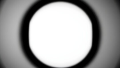 Abstract black and white composition featuring a blurred, circular form with a bright center.