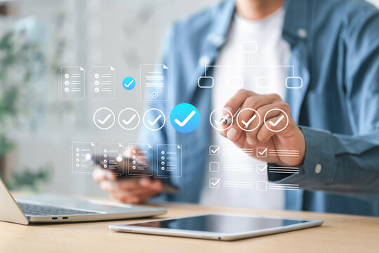 Document management concept , Businessmen check electronic documents approval and quality control online compare statistical data .