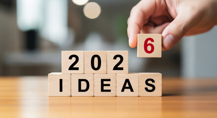 2026 business year end christmas new year planning concept with wooden blocks showing 2026 and ideas for holiday marketing strategy and celebratory mood