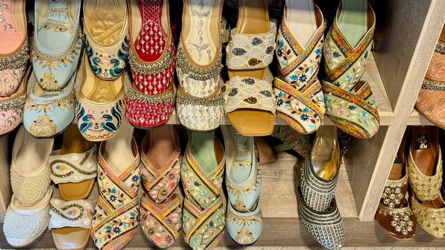 These vibrant, handcrafted traditional Indian juttis feature intricate embroidery and embellishments, perfect for adding a touch of ethnic elegance to any outfit. Originating from North India, these u