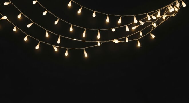 Twinkling fairy lights garland on a pure black background