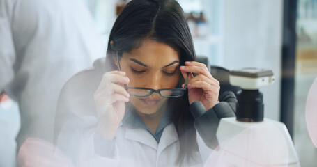 Scientist, woman and glasses in laboratory for vision, medical research or innovation development. Science, microscope and person with eyewear for safety, protection or eyesight correction with bokeh