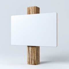 Blank white sign on weathered wooden post against a clean plain background isolated on white background