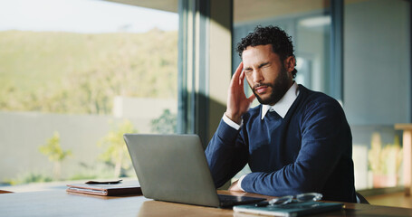 Fototapeta premium Frustrated, businessman and headache with laptop, stress or overworked for pressure in office. Tired, man or employee with migraine, fatigue or burnout for pain, vertigo or mental health in workplace