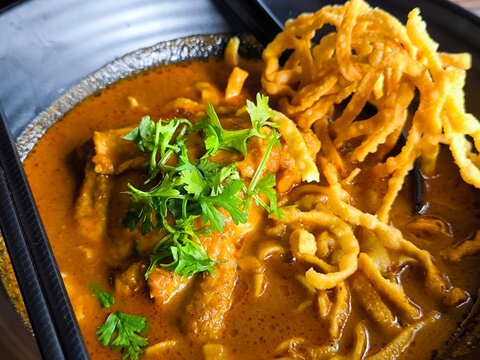 Close-Up of Khao Soi in Black Bowl. thai food